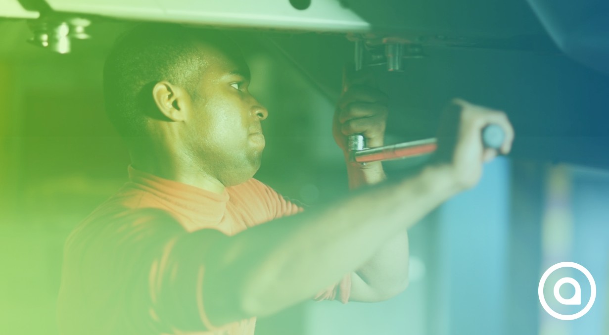 A man is working on a car